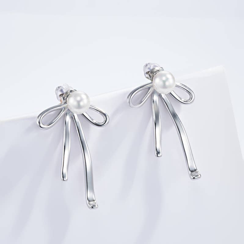 Boucle d’oreille noeud 🪢 en acier inoxydable