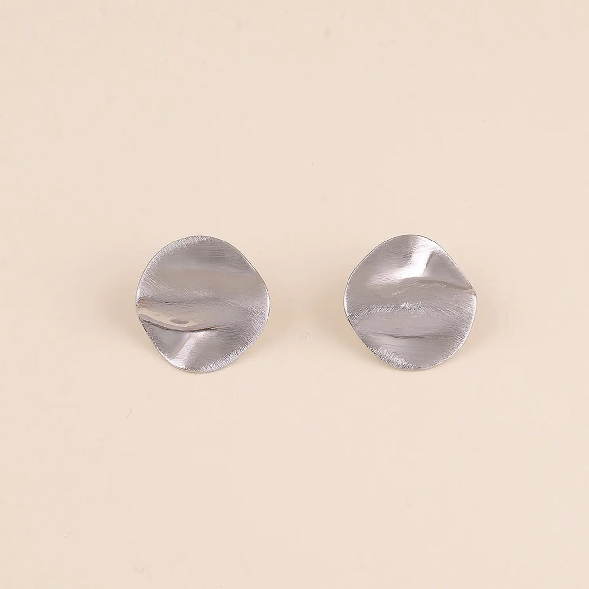 Boucles d’oreilles ondulée effet brossée