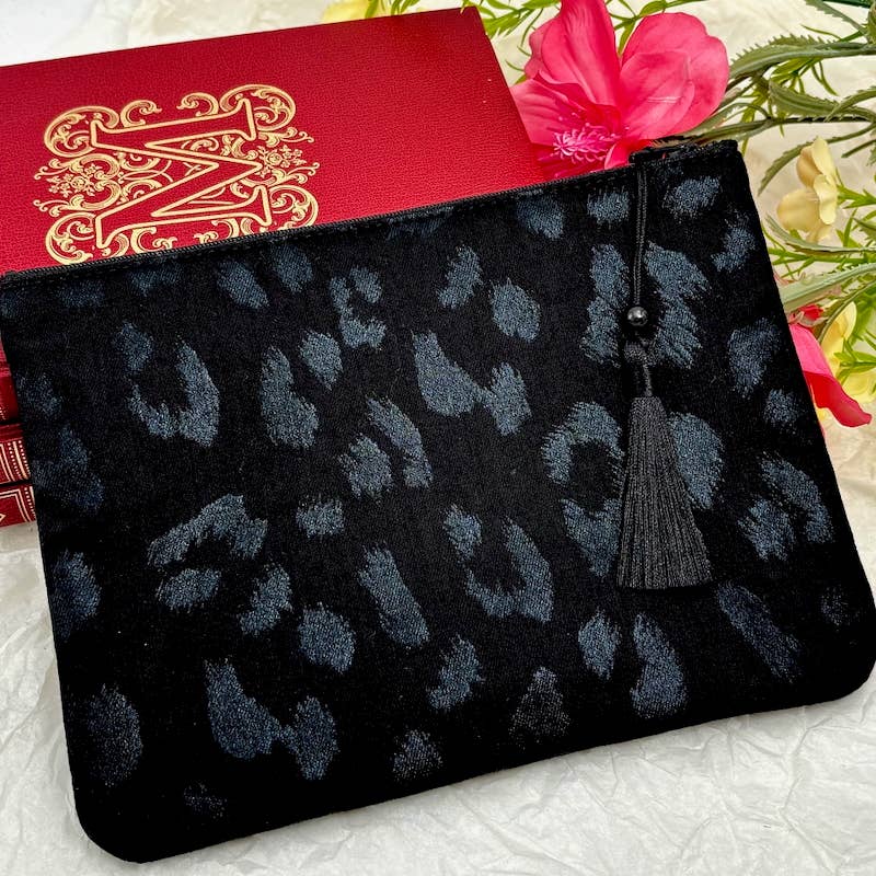 Trousse léopard à paillettes