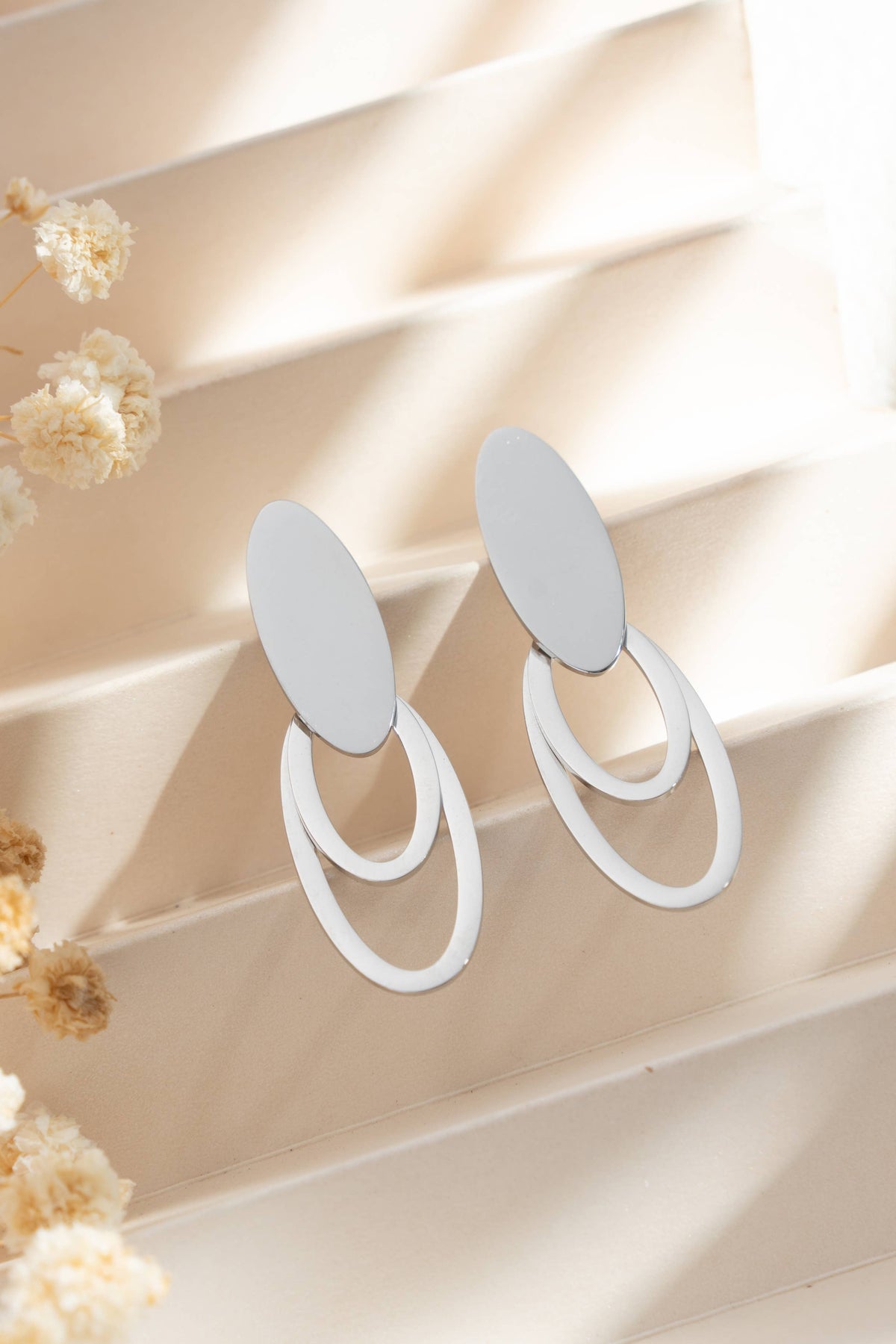 Boucles d’oreilles ovales acier doré argenté modernes